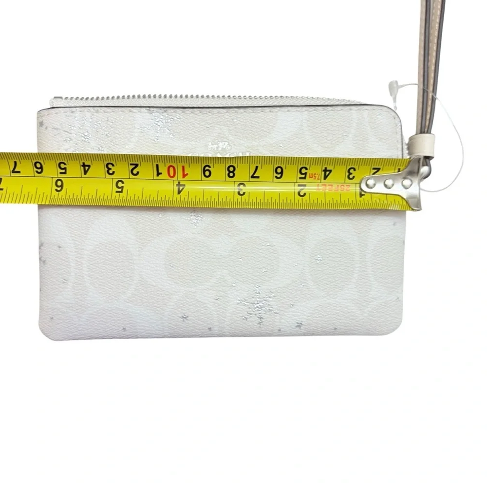 Coach white snowflake signature Wristlet bag